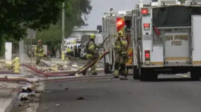 Police and firefighters respond to an explosion rocking the California city of Palm Springs